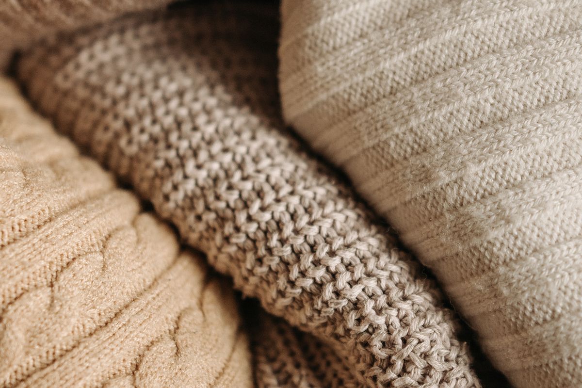 Close-up of soft knitted wool texture in natural light