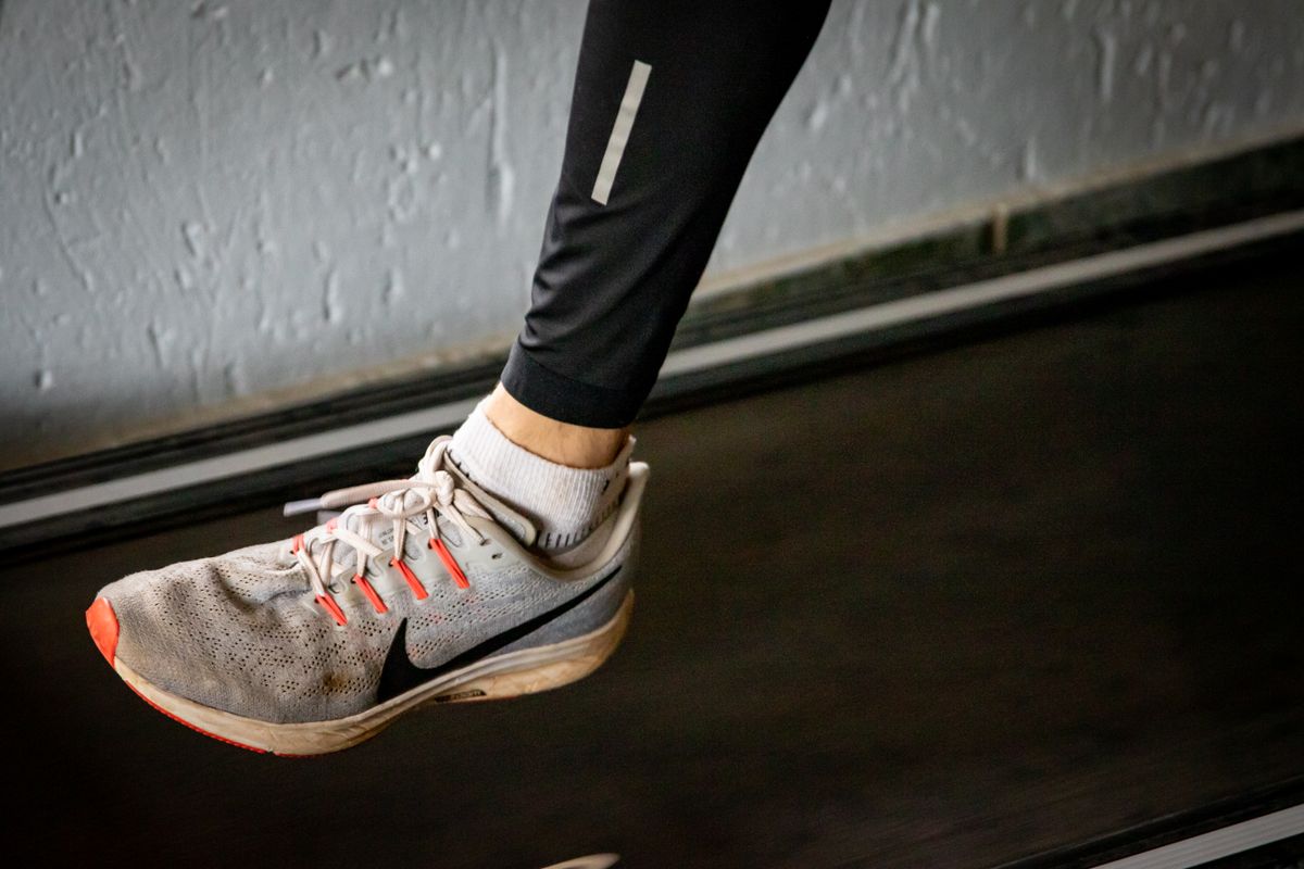 Close-up of the worn rubber sole of a single sneaker