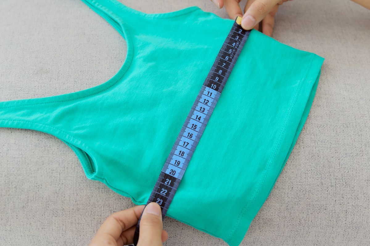 Sewn clothing label tag inside a garment collar